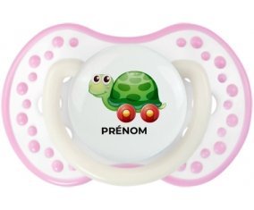 Jouet toys tortue avec roues avec prénom : Blanc-rose phosphorescente Tétine embout Lovi Dynamic