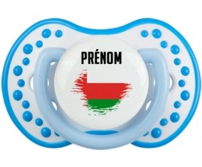 Drapeau effet pinceau Oman avec prénom Sucette LOVI Dynamic Blanc-bleu phosphorescente