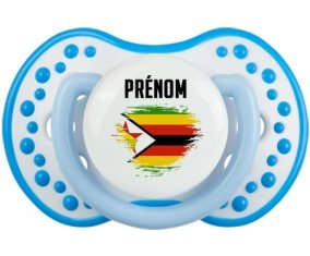 Drapeau effet pinceau Zimbabwe avec prénom Sucette LOVI Dynamic Blanc-bleu phosphorescente